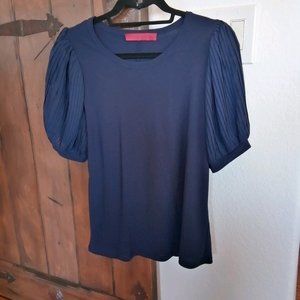 navy blouse with sheer puff sleeve